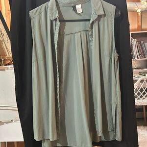 Divided olive green sleeveless vest